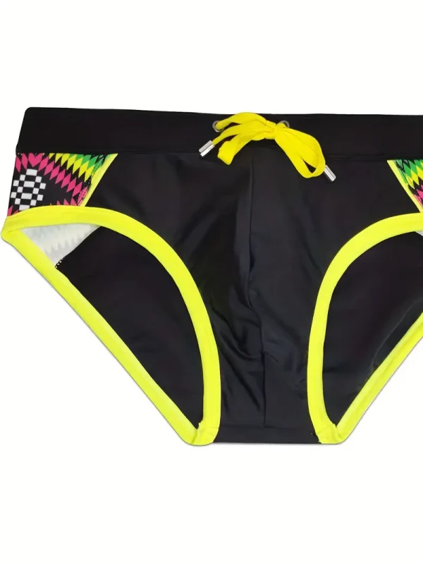 Traje de baño de bloques de color. Negro y amarillo